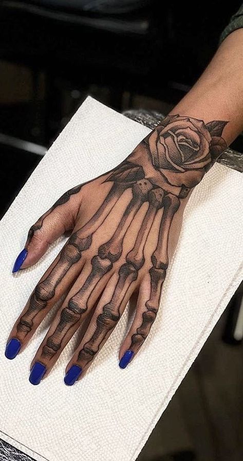 Skeleton On Hand Tattoo, Hand Tattoos Skeleton, Hand Tattoo Meaning, Skeleton Hand Tattoos, Tattoo Main, Hand Skeleton, Small Wave Tattoo, Skull Hand Tattoo, Rose Hand Tattoo