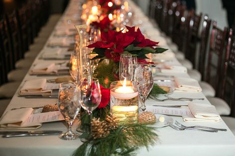 Votives and poinsettia's really wrap this holiday tablescape together #bfloralnyc Poinsettia Table Decor, Poinsettia Tablescape, Noche Buena Table Set Up, Christmas Table Settings Poinsettia, Christmas Disposable Tableware, Gold Flatware Table Setting Christmas, Dinnign Table Christmas Placesettings, Poinsettia Decor, Holiday Tablescapes