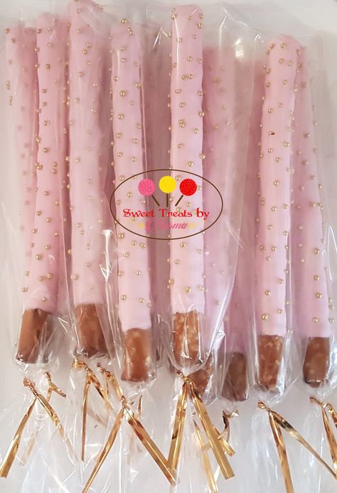 Pink and Gold Chocolate Covered Pretzels Pink And Gold Chocolate Covered Pretzels, Pink And Gold Pretzel Rods, Pretzel Sticks Dipped In Chocolate Pink, Pink Dipped Pretzels, Pink Pretzel Rods, Rose Gold Chocolate Covered Pretzels, Pink Pretzels, Pink Chocolate Covered Pretzels, Bridal Shower Chocolate