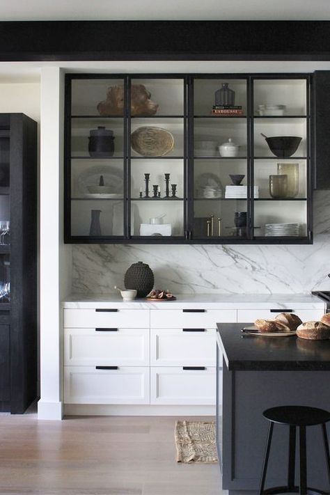 I am in love with black cabinets! Are you doing a kitchen remodel? Definitely think about using black so you will be on trend. Two Toned Kitchen Cabinets, Glass Kitchen Cabinets, Kitchen Table Lighting, Black And White Kitchen, Kabinet Dapur, Two Tone Kitchen, Black Kitchen Cabinets, Marble Counter, Butler Pantry