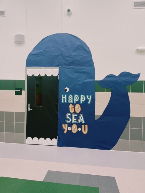 Ocean themed classroom door. Whale eating door. Elementary school. Very cute! #elementaryschool #classroomdoor #oceantheme Beach Hallway Decorations School, Ocean Theme Preschool Classroom Door, Beach Classroom Door, Ocean Theme Classroom Door, Whale Decorations For Classroom, Ocean Themed Classroom Ideas, Ocean Theme School Hallway, Classroom Door Sea Theme, Ocean Classroom Theme