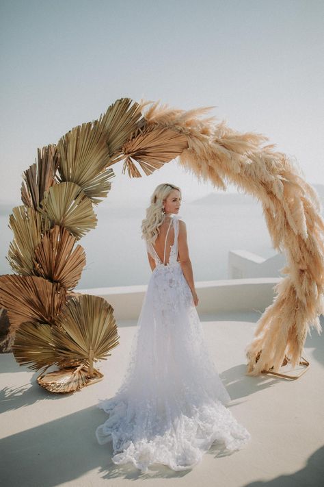 bride standing in front of dried botanical and pampas grass wedding arch Intimate Destination Wedding, Wedding Projects, Grass Wedding, Cashew Chicken, Breakfast At Tiffany's, Santorini Wedding, Half Baked, A Wedding Dress, Gone With The Wind