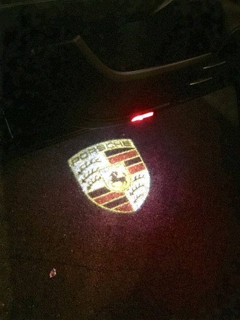 Porsche LED Door Light/Logo Projector.  #porsche #cayenne Car Door Led Projector Light, Porsche Cayenne Aesthetic, Buying First Car, Red Porsche, Led Projector Lights, Batman Comic Wallpaper, Light Logo, Door Light, Lighting Logo