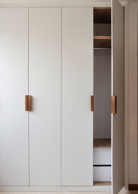 Minimal Wooden Door Handles for bedroom closets in our 'Apartment No.149' Project. Closet Handles Bedrooms, Handles For Cupboards, Scandinavian Closet Doors, White Closet Handles, Bedroom Closet Inspirations, Minimal Closet Doors, Modern Built In Closet, Door Handles For Wardrobes, Modern Bedroom Closet Doors