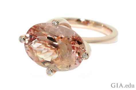 This 10 ct oval morganite makes quite a fashion statement set horizontally in the trendy east-to-west style. The 18K rose gold setting includes four diamond accents in the prongs. Red Diamond Ring, Rose Gold Cocktail, Morganite Engagement Ring Rose Gold, Morganite Jewelry, Vintage Cocktail Ring, Oval Diamond Ring, Morganite Diamond, Bespoke Engagement Ring, Fine Diamond Jewelry