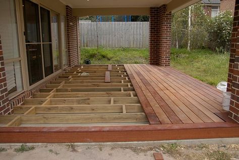 Building A Floating Deck Over Concrete Slab #deckdesigns Deck Over, Build A Floating Deck, Deck Over Concrete, Building A Floating Deck, Concrete Deck, Concrete Patios, Floating Deck, Wooden Deck, Concrete Porch