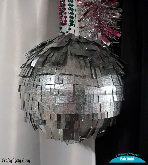 PARTY DIY: New Year's Eve OlyFun Fringe Ball New Years Ball Drop, Mercury Glass Centerpiece, New Years Eve Ball, New Years Ball, New Years Hat, How To Make Glitter, Party Horns, Paper Sewing, Fun Fabric