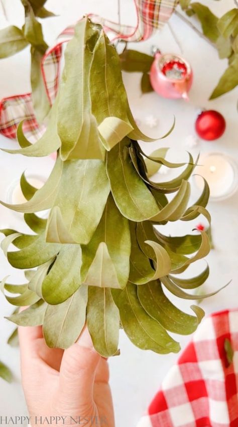 a close up of a bay leaves on a styrofoam cone Styrofoam Cone Christmas Trees, Bay Laurel Tree, Diy Tabletop, Fresh Eucalyptus, Cone Christmas Trees, Gold Spray Paint, Gold Spray, Holiday Tablescapes, Tabletop Christmas Tree