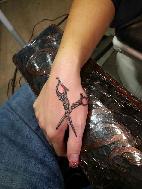 My new scissor tattoo. I love doing hair, and now I love my new tattoo addition! Scissor Tattoo, Cosmetology Tattoos, Shears Tattoo, Hairdresser Tattoos, Colon Tattoo, Places To Get Tattoos, Barber Tattoo, Doing Hair, Scissors Hand