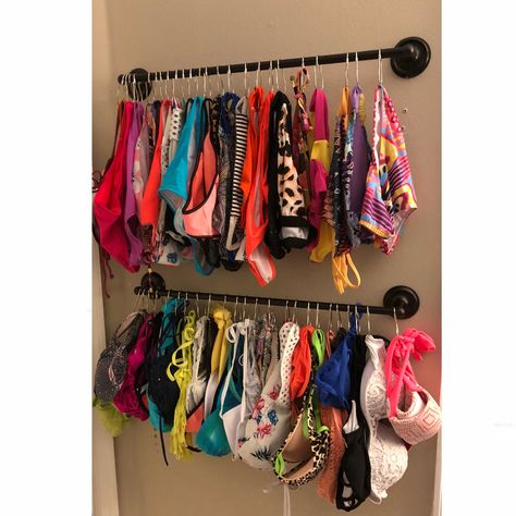 I organized my swimsuits using a towel bar from Walmart ($12) and basic shower hooks ($0.97 for a 12 pack) I got those at Walmart too! I’ve been searching for a way to organize my bikinis and one pieces for a long time! This was cheap, beautiful, and simple! Bra Organization Ideas Closet, Cheap Clothes Organization Ideas, Swimwear Organization Ideas, Bathing Suit Closet Organization, Bathing Suit Display Ideas, How To Store Swimsuits In Closet, Organize Swimsuits Ideas, Organize Bikinis, How To Organize Swimwear