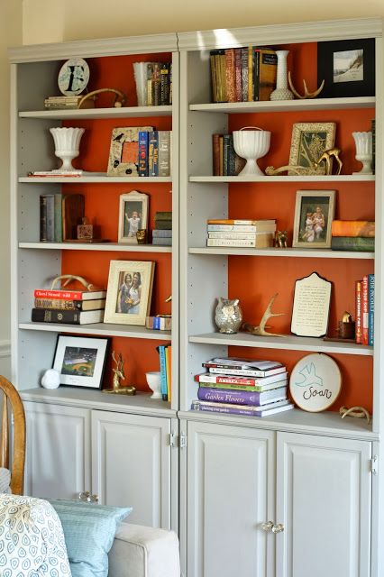 Bright Color Bookshelf, Orange Bookshelves, Vintage Home Decor Eclectic, Bold Background, Home Decor Eclectic, Painted Bookshelves, Wall Shelves Bedroom, Built In Shelves Living Room, Modern Wall Shelf