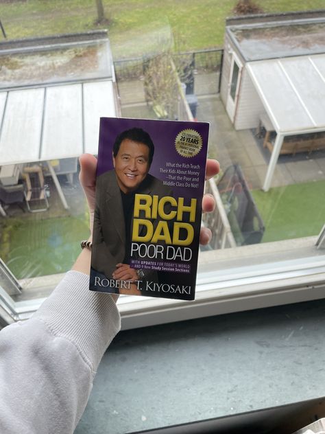 Link to the book: https://amzn.to/40fmkbV Rich Dad Poor Dad by Robert Kiyosaki is a game-changing book that challenges traditional ideas about money and investing. Through his personal experiences with both his "rich dad" and "poor dad," Kiyosaki shares valuable lessons on building wealth and achieving financial independence. If you're ready to take the first step towards financial freedom, grab a copy of Rich Dad Poor Dad today! Rich Dad Poor Dad Book, Robert T Kiyosaki, Traditional Ideas, Kindle Reader, Rich Dad Poor Dad, Personal Finance Books, Building Wealth, Robert Kiyosaki, About Money