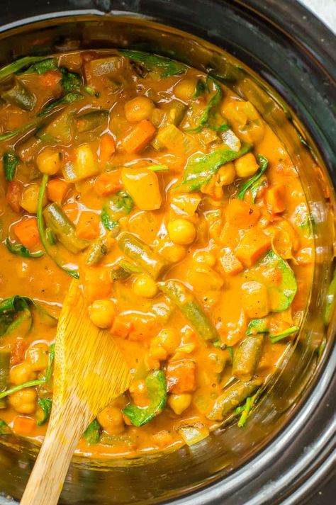 This slow cooker vegetable curry is flavorful, satisfying, and loaded with 5 different veggies and protein from chickpeas. Easy to make in your crockpot, this healthy vegetarian dinner is the perfect way to end a busy day. Chickpea Curry Crockpot, Slow Cooker Chickpea Recipes, Slow Cooker Recipe Vegetarian, Crockpot Curry Vegetarian, Crockpot Meals Vegetarian, Vegetable Stew Crockpot, One Pot Meals Vegetarian, Slow Cooker Vegetarian Recipes, Slow Cooker Chickpea Curry