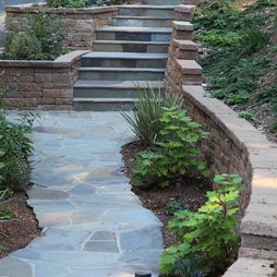 Contrast in Textures, stone pavers with stacked bricks Mulch Landscaping Ideas Diy, Yard Makeover, Mediterranean Landscape, Backyard Ideas For Small Yards, Garden Remedies, Stone Steps, Exterior Stairs, Sloped Garden, Retaining Walls