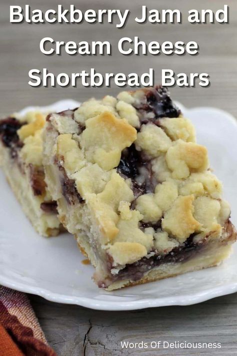 Blackberry Jam and Cream Cheese Shortbread Bars have a buttery top and bottom layer with a creamy filling made with cream cheese and jam. #blackberryjamandcreamcheesebars #wordsofdeliciousness Blackberry Chocolate Dessert, Blackberry Shortbread Bars, Recipes Using Blackberry Jam, Recipes With Blackberry Jam, Cream Cheese Shortbread, Jam Desserts, Recipe Using Jam, Cream Cheese And Jam, Cheese Shortbread