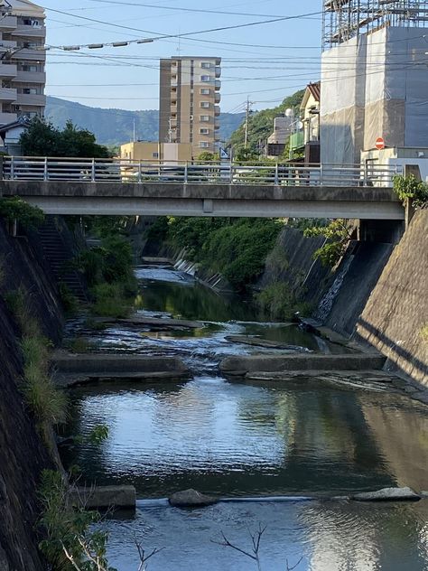 Sasebo River. by Kralicekg The post Sasebo River. appeared first on Alo Japan. Infrastructure Development, River Bank, Japan Photo, West Bengal, Bridge, Japan, Green, Quick Saves