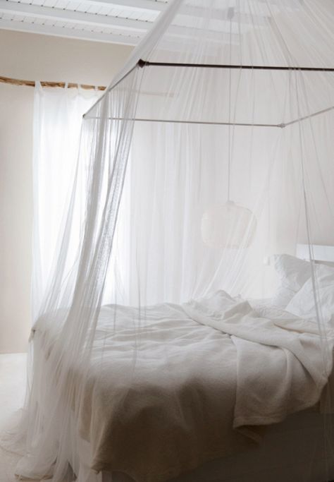 I'm currently having a thing for canopy beds. With its simple sheer paneling, this one is cozy and chic Beautiful Bed Designs, All White Bedroom, Stylish Bedroom Design, White Canopy, Bed Design Modern, White Bed, Four Poster Bed, Four Poster, Romantic Bedroom