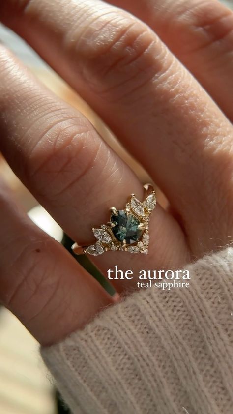 The Aurora 0.88 CT Pear Cut Teal Sapphire Ring✨ Should I do more Aurora rings?🧚‍♂️ #sapphire #fairyring #fantasyjewelry #engagementring… | Instagram Sapphire Engagement Ring Fairy, Aurora Engagement Ring, Engagement Rings Inspired By Nature, Teal Wedding Ring, Teal Sapphire Engagement Rings, Winter Engagement Ring, Faerie Engagement Ring, Blue Engagement Ring Sapphire, Engagement Rings With Birthstones