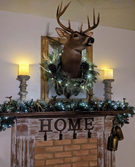 Deer Head Above Fireplace, Decorate Deer Mount For Christmas, Decorating With Antlers, Deer Head Decor, Elk Head, Deer Mounts, Wood Fireplace, Deer Head, Christmas Deer