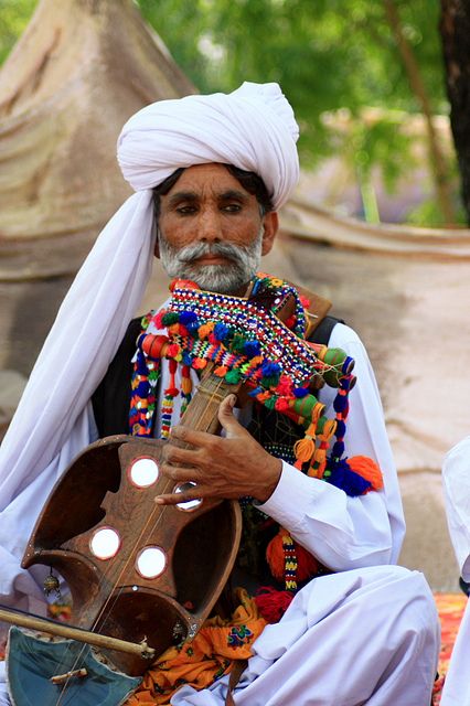 The old baloch singer, a man in tradition clothes from Balochistan, Pakistan by Engineer J Pakistani Art, People Of Pakistan, Pakistan Culture, Pakistani Culture, Balochi Dress, Pakistan Zindabad, Folk Dresses, India And Pakistan, South Asia