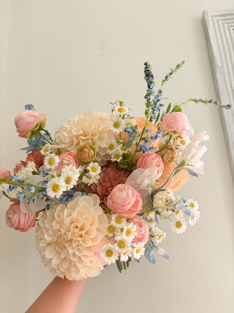 ❤The bouquet with colorful (light blue, pastel pink, white, peach) faux flowers in many types, some of which are real touch flowers.  They are perfect for spring or summer weddings~~  ❤Matching bouquets, boutonnieres... All matching items are available, please message us for a quote, we would love to work with your budget and do custom wedding packages just for you  ❤Change flower colors If you love this bouquet but want different colors, please send me a message, and we'd be happy to provide a Colorful Wedding Flowers Bouquet, Blue Wild Flowers Wedding, Summer Wild Flower Wedding, Colourful Pastel Wedding, August Bridal Bouquet, Spring Wedding Boutonniere, Colorful Wedding Inspiration, Fairytale Wedding Bouquet, Colourful Bouquet Wedding