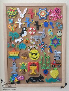 displayed on cork board Display Perler Bead Creations, Perler Bead Display Ideas, How To Display Perler Bead Art, Perler Bead Teacher Gift, Perler Bead Display, Bead Mania Ideas, Bead Display, Perler Bead Creations, Makerspace Activities