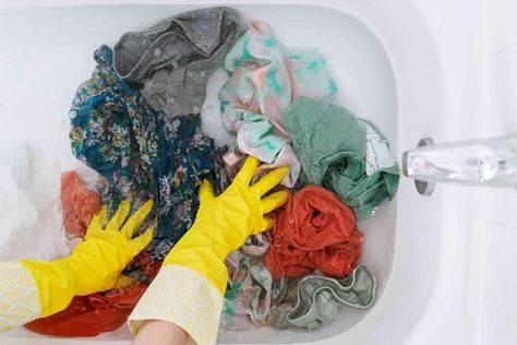 If you your washer isn't working and you can't get to the laundromat, you can wash a small load of clothes in a bathtub. Learn the right way to wash clothes in a bathtub. How To Wash Clothes In Bathtub, Washing Clothes In Bathtub, How To Hand Wash Clothes In Bathtub, Hand Washing Clothes, Handwashing Clothes, Diy Bathtub, Clean Washer, Washing Towels, Clean Bathtub