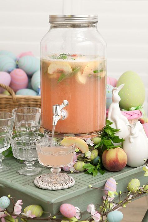 Peach and mint mocktail in drink dispenser. Drink Dispenser Ideas, Drink Dispenser Recipes, Mint Mocktail, Dispenser Ideas, Easter Drink, Vintage Garden Party, Juice Dispenser, Holiday Punch, Cocktail And Mocktail