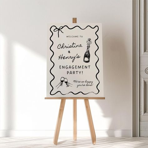 Welcome your guests with style using our Hand-Drawn Engagement Party Welcome Sign Canva Template! This elegant design features a whimsical wavy border, handwritten-style fonts, and charming hand-drawn elements, including a champagne bottle and "cheers" elements. Perfect for setting the tone of your celebration, this sign is fully customizable in Canva, allowing you to personalize it to match your event's theme. 𝗢𝗡𝗖𝗘 𝗬𝗢𝗨 𝗣𝗟𝗔𝗖𝗘 𝗬𝗢𝗨𝗥 𝗢𝗥𝗗𝗘𝗥: You will receive an email to download Anniversary Party Sign, Canva For Wedding, Earthy Engagement Party, Welcome To Our Engagement Party Signs, Diy Party Welcome Sign, Diy Engagement Party Sign, Lowkey Engagement Party, Tying The Knot Engagement Party, Engagement House Party