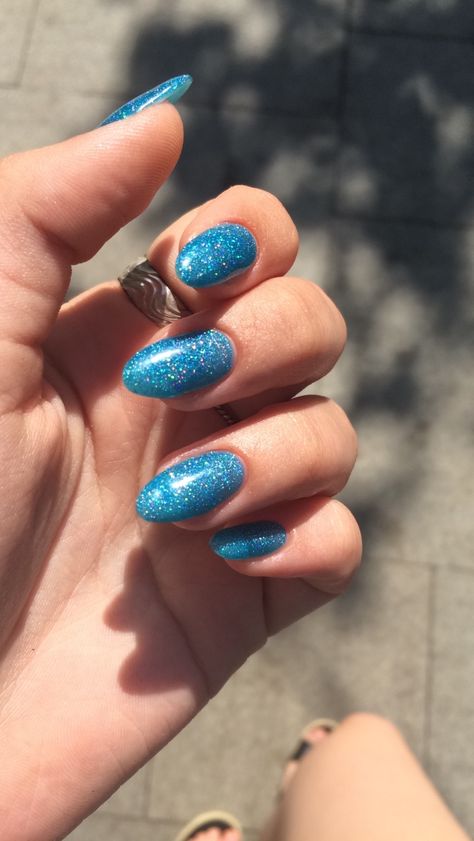 Blue sparkle nails Sparkling Blue Nails, Light Sparkly Blue Nails, Sparkly Nails Blue, Blue Sparkle Nail Designs, Blue Sparkle Acrylic Nails, Sparkly Blue Nails Acrylic, Blue Sparkles Nails, Blue Sparkling Nails, Cute Sparkly Nails