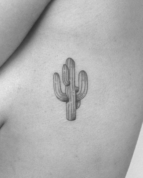 Minimalist cactus tattoo on the rib cage - Tattoogrid.net Saguaro Tattoo, Minimalist Cactus, Mysterious Tattoo, Cow Tattoo, Geometric Sleeve Tattoo, Cactus Tattoo, Circle Tattoos, Tattoo Minimalist, Chest Tattoos