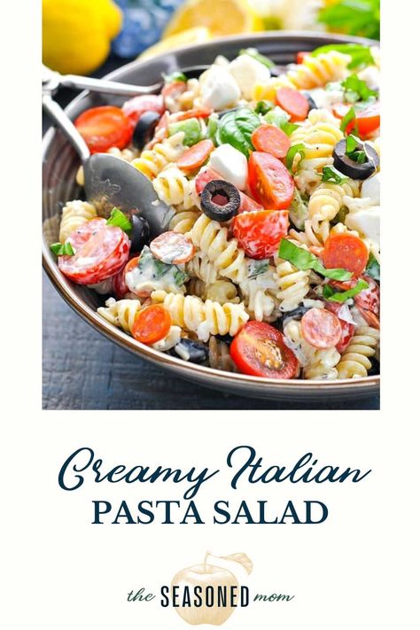 Full of fresh, flavorful ingredients, this Creamy Pasta Salad recipe is a quick and easy dish for picnics, potlucks, or light and satisfying dinners. The Italian-inspired ingredients like pepperoni, mozzarella, tomatoes, bell pepper, olives, and fresh herbs are tossed in a Creamy Italian dressing for a crowd-pleasing meal that makes summer entertaining easy! Side Dish Recipes | Easy Pasta Salad Dish Recipes Easy, Thanksgiving Pasta, Creamy Italian Pasta Salad, Pasta Primavera Salad, Creamy Pasta Salad Recipe, Creamy Italian Dressing, Creamy Pasta Salad, Creamy Pasta Salads, The Seasoned Mom