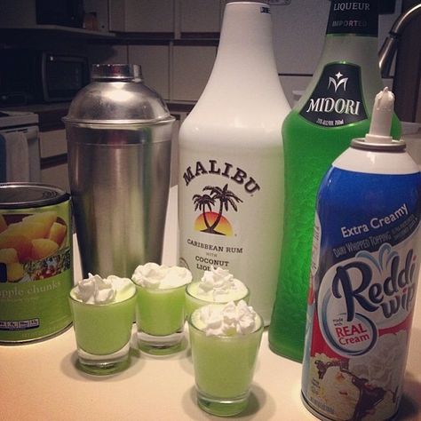 THE SCOOBY SNACK 1/2 oz. (15ml) Midori Melon Liqueur 1/2 oz. (15ml) Malibu Coconut Rum Splash of Pineapple Juice Splash of Whipped Cream #ma... Juice Splash, Midori Melon, Malibu Coconut, Melon Liqueur, Scooby Snacks, Tipsy Bartender, Liquor Drinks, Shot Recipes, Jello Shots