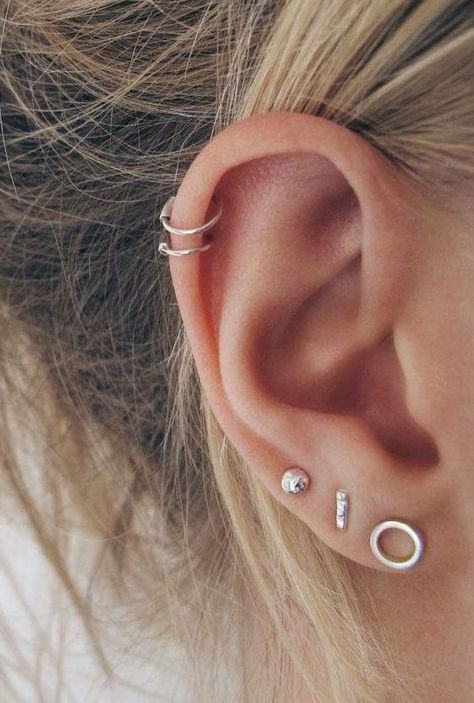 stacked lobe piecrings and a double helix one with mix and match minimalist earrings stud and hoop ones Ear Piercing Helix, Conch Ring, Ear Peircings, Cool Ear Piercings, Pretty Ear Piercings, Piercing Tragus, Multiple Ear Piercings, Cute Ear Piercings, Ear Piercings Cartilage