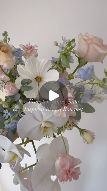 Windflower • Wedding Florist on Instagram: "DAY 6 - Pastel Pink & Dusty Blue // we brought this Pinterest board bouquet to life!  This French country side bouquet showcases some beautiful cosmos, blue delphinium, tweedia, orchids, pastel garden roses and quicksand roses 🤍✨  • • • #flowers #weddingflowers #weddingflorals #weddinginspiration #weddingflorist #bridal #bridalbouquet #bridal #2024wedding #2024bride #2025bride #2025wedding" Pastel Bouquet Wedding, French Country Side, White Orchid Bouquet, Pastel Garden, Pastel Bouquet, Blue Delphinium, Orchid Bouquet, Wedding Bouquets Pink, Pink Dusty