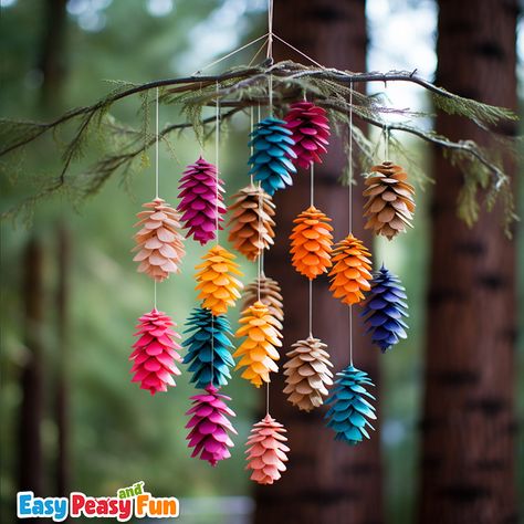 15+ Pine Cone Crafts and Decoration Ideas - Easy Peasy and Fun Painted Pine Cones Crafts, Pine Crafts For Kids, Diy Nature Crafts Decor, Decorative Arts Ideas, Pine Cone Mobile Diy, Decoration With Pine Cones, Pine Cones Painting, Pinecone Crafts Halloween, Pine Cone Garden Ideas