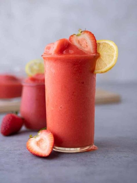 Easy Frozen Strawberry Lemonade - Lifestyle of a Foodie Watermelon Slushie Recipe, Frozen Strawberry Lemonade Recipe, Frozen Strawberry Lemonade, Homemade Strawberry Lemonade, Lifestyle Of A Foodie, Strawberry Lemonade Recipe, Frozen Drink Recipes, Fun Drink Recipe, Iced Drinks Recipes