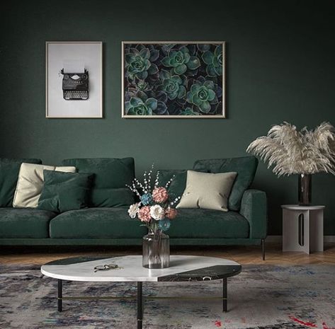 If you're looking for ways to bring the outside in, you might want to consider incorporating the color green. It's a timeless choice that can impart a range of emotions depending on the shade and intensity. #hunkerhome #green #greencolor #colorideas #homedecor Dark Green Sofa Color Combinations, Green Sofa Living Room Colour Schemes Interior Design, Dark Green Couches, Green Couch Living Room, Green Sofa Living Room, Dark Green Wallpaper, Dark Green Walls, Green Ideas, Green Couch