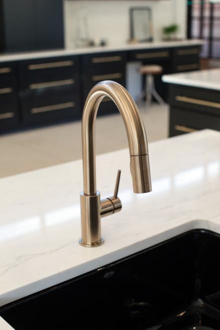 As seen on Fixer Upper, this gold sink fixture gives the kitchen of the Barrett home a modern flair. Gold Sink Faucet, Industrial Faucet, Corner Kitchen Sink, Fixer Upper Kitchen, Modern Kitchen Faucet, Best Kitchen Sinks, Modern Kitchen Sinks, Gold Faucet, Kitchen Sink Design