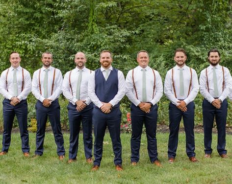 Groom In Vest Groomsmen In Suspenders, Suspenders With Jeans Wedding, Men In Suspenders Wedding, Wedding Suit With Suspenders, Men’s Wedding Party Attire, Jeans Suspenders Groomsmen, Blue Jean Wedding Men Groom Attire Sage Green, Mens Wedding Attire Suspenders, Gray Mens Wedding Attire