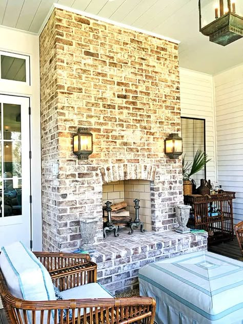 Southern Living’s 2019 Idea House in Fernandina Beach – Amelia Island Living eMagazine Screened In Porch With Brick Fireplace, Veranda With Fireplace, Patio Brick Fireplace, Screened In Porch Fireplace Ideas, Back Porch Brick Fireplace, Outdoor Brick Fireplaces, Two Way Fireplace Indoor Outdoor, Outdoor Fireplace Screened In Porch, Outdoor Fireplace Porch