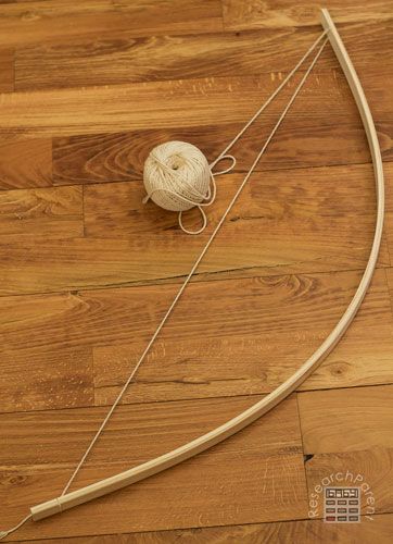 Homemade Bow and Arrows - ResearchParent.com Robin Hood Bow And Arrow Diy, Costume Bow And Arrow Diy, Making A Bow And Arrow, Diy Bow And Arrow Cupid, Diy Cosplay Bow And Arrow, Home Made Bow And Arrow Diy, Cross Bow Diy, Diy Cupids Bow And Arrow, Diy Archery Bow