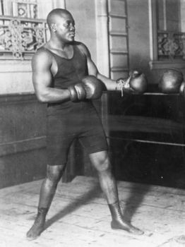 American heavyweight boxer Jack Johnson (and Galveston native) is shown sparring. Johnson's legacy was recently honored with a statue in his hometown.  Photo: Topical Press Agency, Getty Images / Hulton Archive Jack Johnson Boxer, Photographic Portraits, Boxing Images, Mohamed Ali, Heavyweight Boxing, Black Heritage, Sport Portraits, Boxing History, Jim Brown