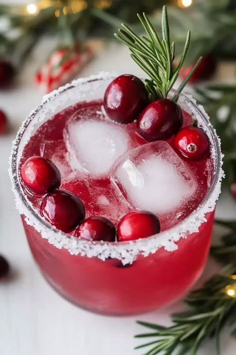 Festive Christmas Cranberry Margarita Christmas Cranberry Margarita, Recipe With Fresh Cranberries, Red Alcoholic Drinks, Christmas Margarita Recipe, Christmas Margaritas, Christmas Margarita, Lime Margarita Recipe, Drinks With Cranberry Juice, Cranberry Simple Syrup