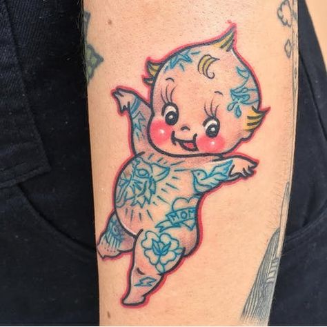 Tattoo uploaded by Tattoodo | Tattoo by Jori Lakars #JoriLakars #kewpietattoo #kewpiedolltattoo #kewpie #kewpiedoll #cutie #baby #tattooed #rose #heart #tiger #oldschool | 699727 | Tattoodo Traditional Baby Tattoo, Traditional Kewpie Tattoo, Traditional Tattoo Baby, Kewpie Tattoo, Kewpie Art, Baby Tattoo, Cherub Tattoo, Doll Tattoo, Tattoo Old School