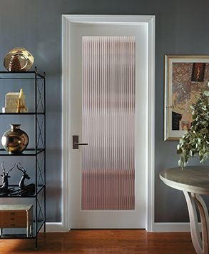 This beautiful vertical Reed glass interior decorative door offers obscurity and modern appeal for residential applications. This fluted glass interior door is a great choice for kitchens, laundry rooms, offices and any room where style and light is desired, but not full visibility. The Reed style door is offered in a variety of 9 wood species to complement any interior including: primed white, pine, oak, knotty pine, hemlock-fir, maple, knotty alder, cherry and African mahogany. Kitchen Glass Doors, Door Hallway, Frosted Glass Interior Doors, Future Furniture, Door Bedroom, House Redo, Frosted Glass Door, Reeded Glass, Asian Interior