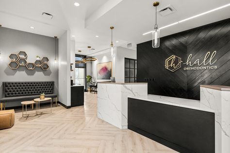 Black And Gold Dental Office, Office Foyer Design Entrance, Dental Office Waiting Room Ideas, Beautiful Dental Offices, Modern Farmhouse Dental Office, Chamber Of Commerce Logo Ideas, Dental Office Bathroom Ideas, Black And White Dental Office, Modern Doctors Office Waiting Rooms