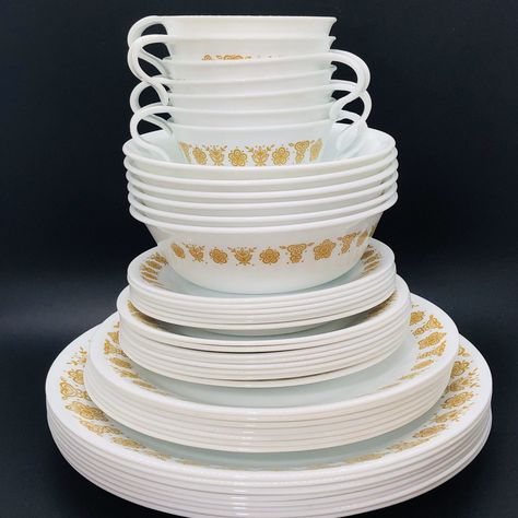 "For your consideration, Vintage Corelle Pyrex \"Butterfly Gold\" Below, are the measurements for all available pieces. - Dinner Plate (10¼\" diameter) - Salad Plate (8½\" diameter) - Bread & Butter Plate (6¾\" diameter) - Coupe Cereal/Soup Bowl (6\" diameter) - Saucer (6¼\" diameter) - Hook Cup (4\" diameter) - Platter (12\" x 10\") - Milk Glass Mug (5\" x 2.75\") - Fruit Cup (5\" x 1.5\") This set is in excellent vintage condition with no visible chips or flaws. Some pieces show a tiny bit Vintage Plastic Dinnerware, Retro Pyrex Cookware, Vintage Plastic Kitchenware, Vintage Dishware Cookware, Vintage Pyrex Mug, Vintage Pyrex Collection, Corningware Vintage, Vintage Pyrex Patterns, Vintage Dishes Antiques