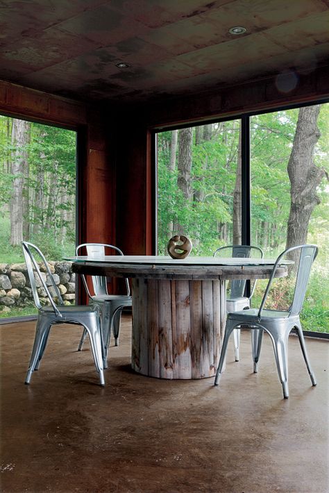 "Repurpose, refurbish, recycle" was the guiding principle for a metals broker in Ontario who harnessed his passion for–and knowledge of–industrial materials to create a new house from old scrap. Wire Spools, Cable Spool Tables, Wooden Cable Spools, Spool Ideas, Spool Table, Spool Furniture, Enclosed Porch, Spool Tables, Cable Spool