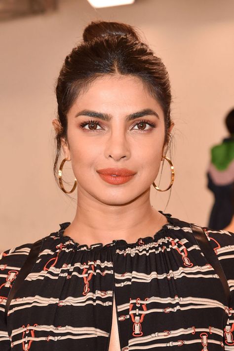 14 Hairstyles For Round Faces That Are Seriously Flattering Round Face Earrings For Women, Round Face Hairstyles Women, Priyanka Chopra Hairstyle, Round Face Updo, Priyanka Chopra Updo, Bollywood Style Round Earrings, Earrings For Round Face, Priyanka Chopra Highlights, Updos For Round Faces